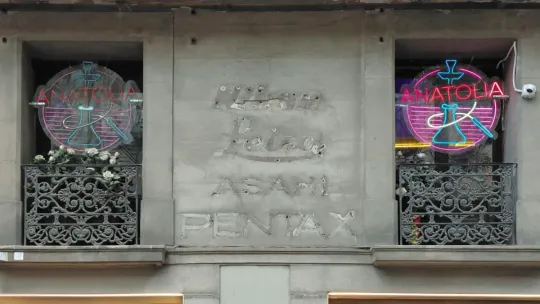 Barcelona’s Forgotten Camera Shop Still Etched Into La Rambla’s Walls