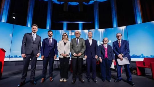 A modern, bustling city skyline at dusk, with lights reflecting on a body of water, symbolising urban development and economi