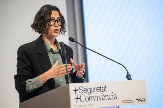 Catalonia's Interior Minister Núria Parlon speaking at a press conference about public safety and crime reduction strategies.