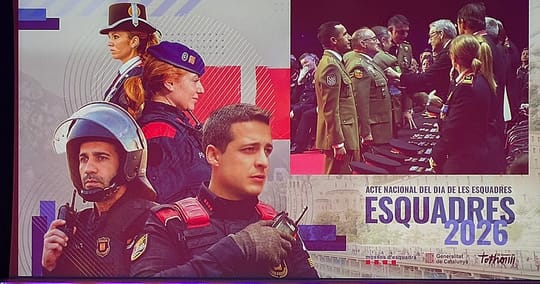A medal being presented by a police commissioner to a military officer in uniform.