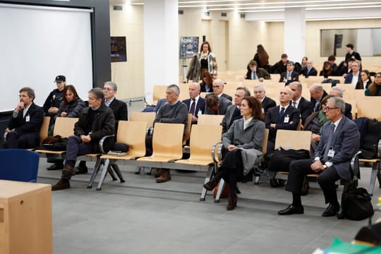 Jordi Pujol, former President of Catalonia, seated in a courtroom setting, possibly during a previous hearing or a similar le