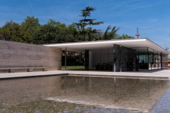 Mies van der Rohe Pavilion in Barcelona, a modernist building with a reflective pool.