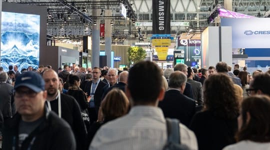 Barcelona's Fira Gran Via congress centre with modern architecture and a bustling atmosphere.