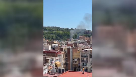 Smoke rising from the Wikihousing building in Barcelona's Poble-sec district after a fire.