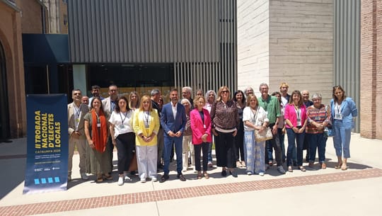 Officials at a meeting discussing Catalan language policy in Sant Cugat del Vallès.