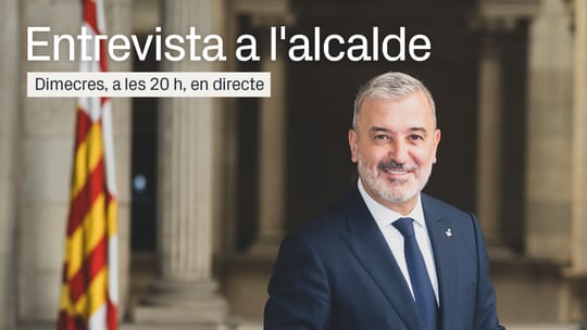 Barcelona Mayor Jaume Collboni speaking at a podium in the Saló de Cent