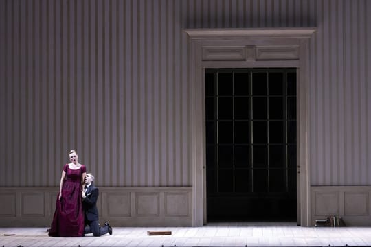 A dramatic stage scene from the opera Werther at the Gran Teatre del Liceu, showing tenor Xabier Anduaga as Werther and mezzo