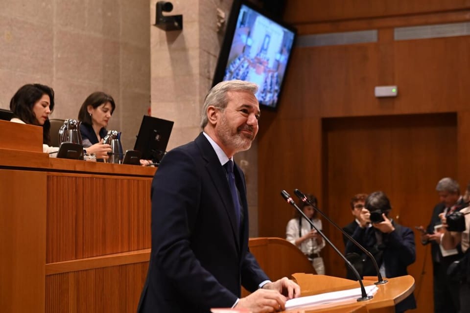 A close-up of a Romanesque mural painting, showing faded colours and intricate details of religious figures, possibly from th