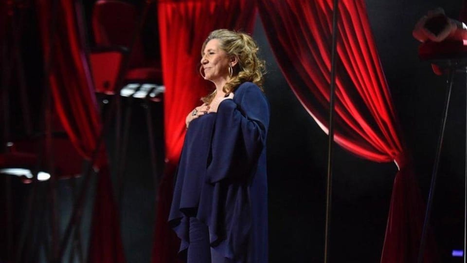 The historic Palau Savassona building, home to Ateneu Barcelonès, with its neoclassical facade and arched windows.