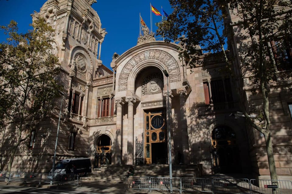 A Mossos d'Esquadra police car outside a courthouse in Catalonia.