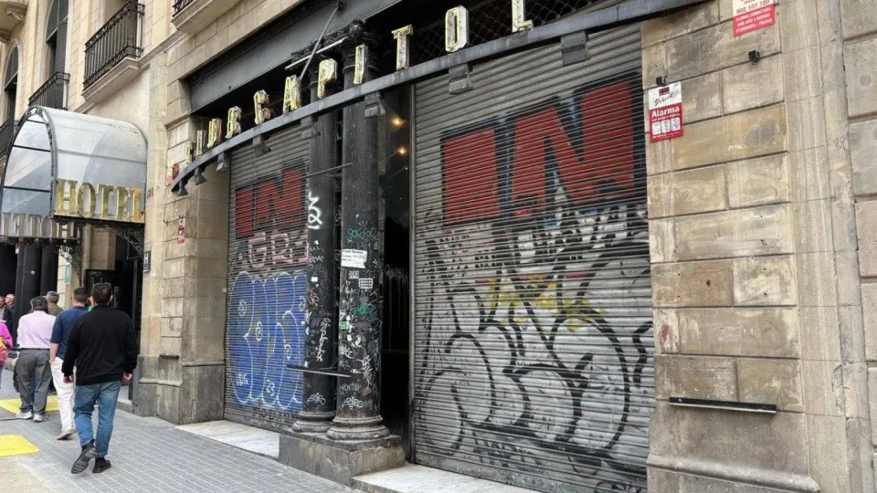Historic Capitol Theatre facade on La Rambla, Barcelona, with its iconic sign and bustling street scene.