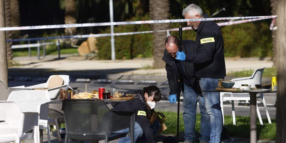 A Mossos d'Esquadra police cordon at a crime scene in Barcelona's Diagonal Mar district.