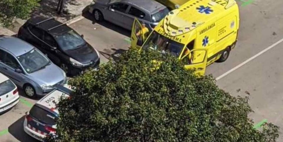 Police tape or a police car at a crime scene in a city street, indicating an ongoing investigation.