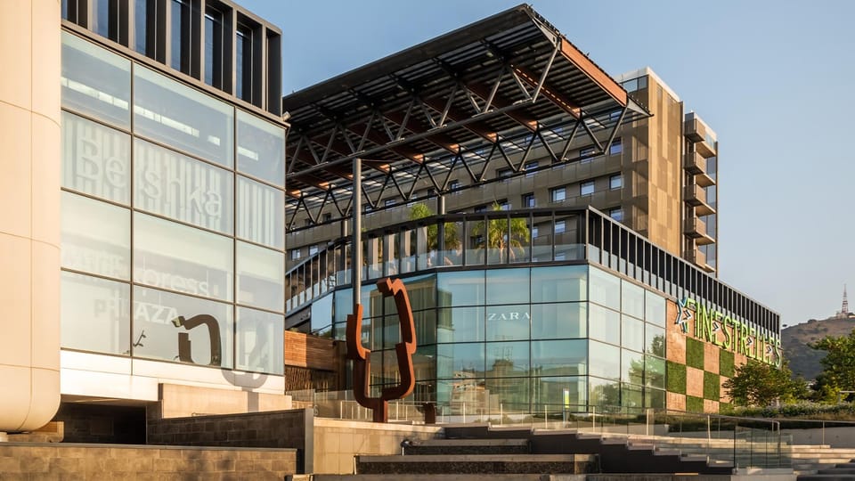 Modern residential buildings in Finestrelles, Esplugues de Llobregat, with panoramic views of Barcelona and the Collserola mo