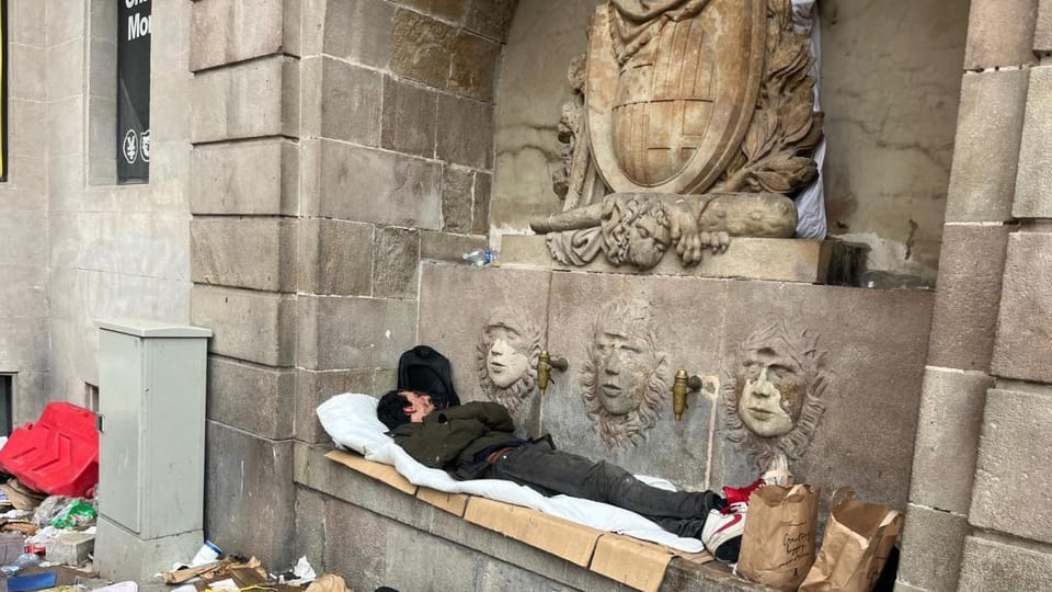 Historic Pla de la Boqueria Fountain Becomes Homeless Encampment