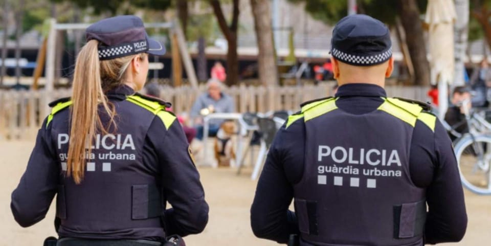 Police van parked on a street in Barcelona's Sant Andreu district.