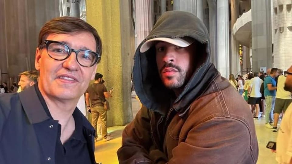 Catalan President Salvador Illa and Bad Bunny pose for a selfie inside the Sagrada Familia basilica in Barcelona.