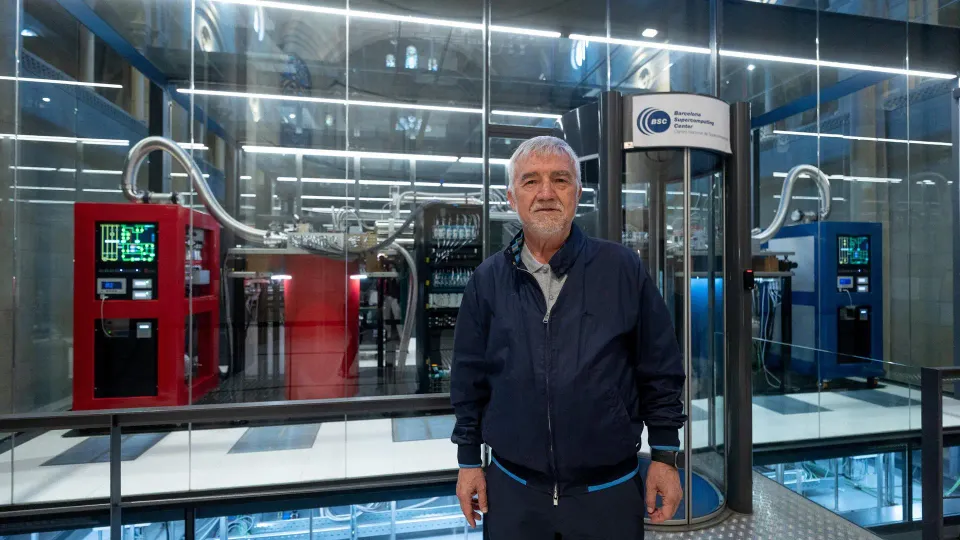 Mateo Valero, director of the Barcelona Supercomputing Center, stands in front of the MareNostrum 5 supercomputer.