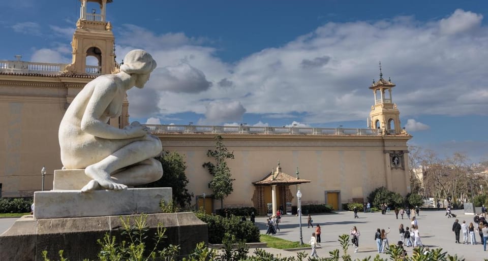 A modern art museum interior with natural light, showcasing contemporary sculptures and visitors, representing cultural inves