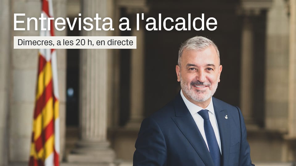 Barcelona Mayor Jaume Collboni speaking at a podium in the Saló de Cent