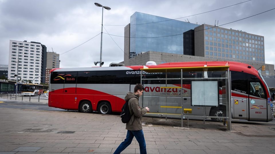 An illustration of the Sants intercity bus station area with buses and a new bicycle parking facility.