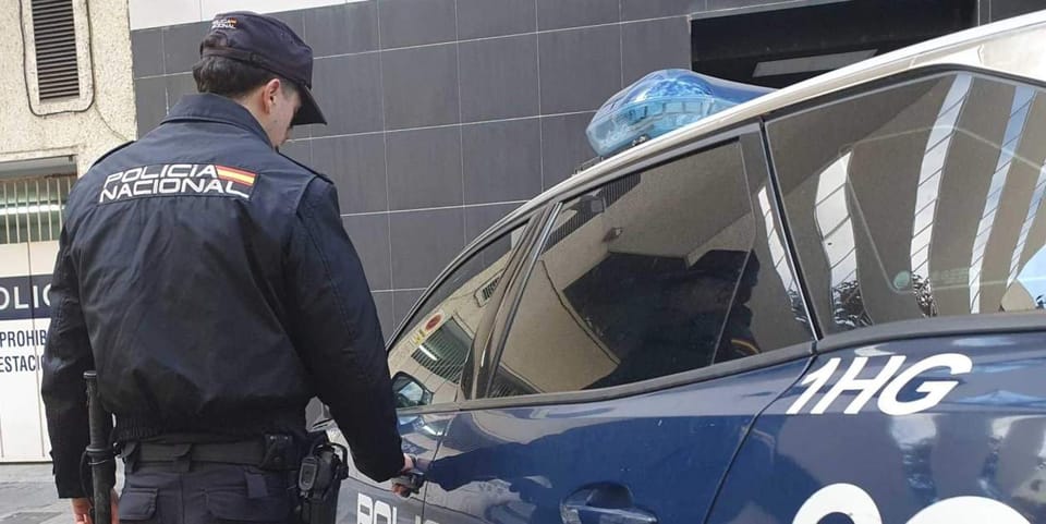 Police officers inspecting shelves of a supermarket, with some bottles of health supplements visible.