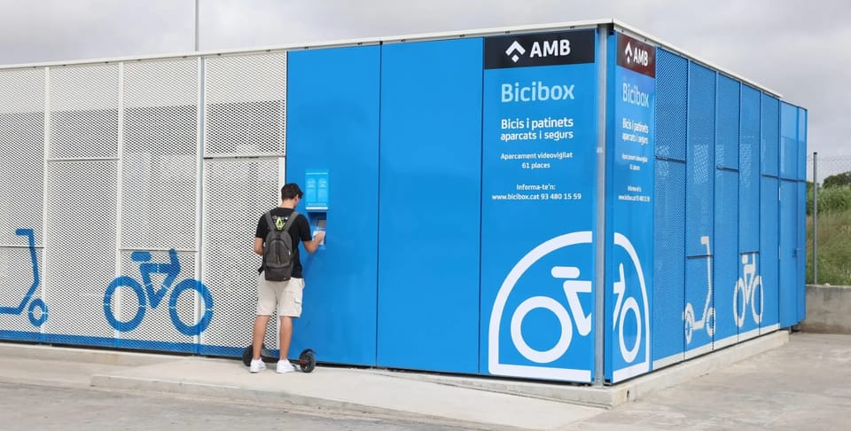 A modern Bicibox parking facility with multiple bicycle and scooter spaces inside a secure, enclosed structure.