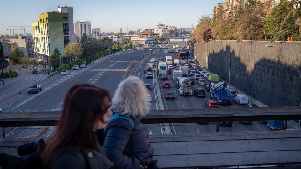 Meridiana Avenue in Barcelona, showing multiple lanes of traffic and surrounding buildings