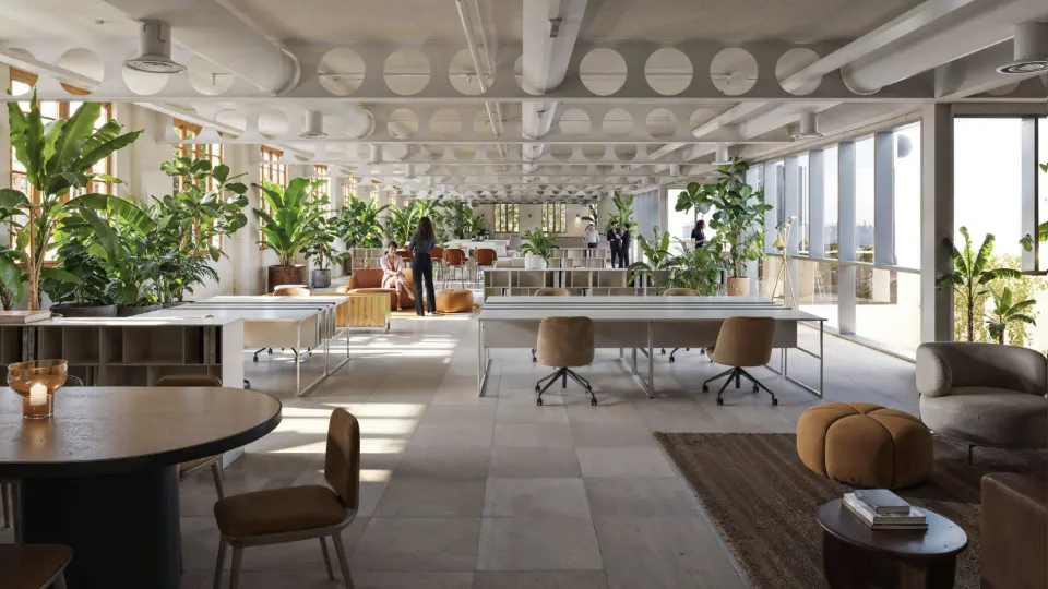 Exterior view of the Nocco office building in Barcelona's 22@ district, showing its modern design and green spaces.